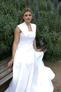 Smoking collar boned bodice, with lace applique and a line skirt with detachable tulle train